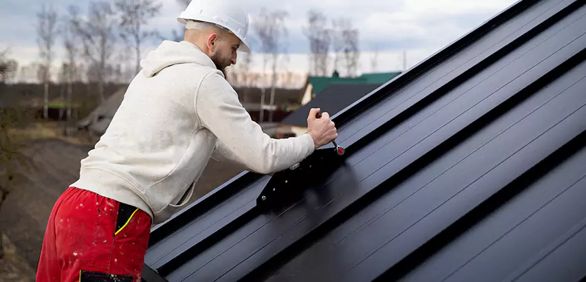 Tin Roof Ridge Cap Installation in Sun Prairie